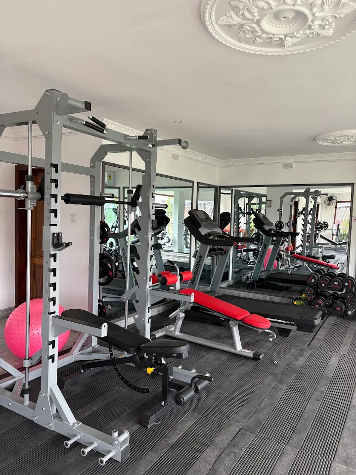 Weights, benches and racks inside Enoba Gym Center